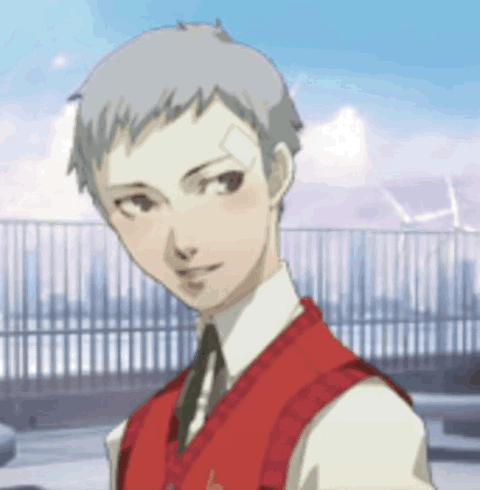 A Young Man With A Bandage On His Face Is Wearing A Red Vest GIF
