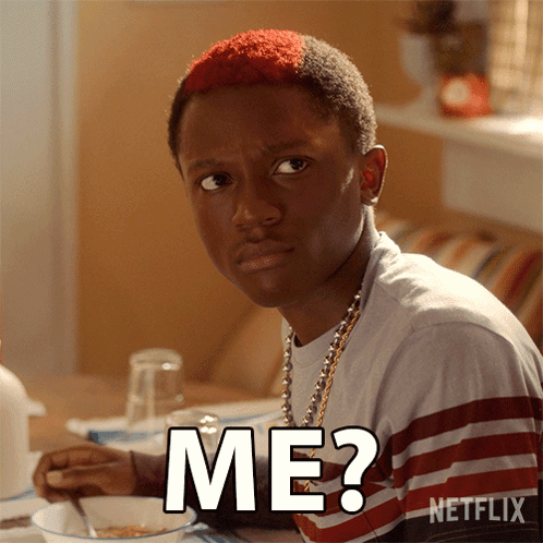 A Young Man With Red Hair Is Sitting At A Table With A Netflix Logo In The Corner GIF