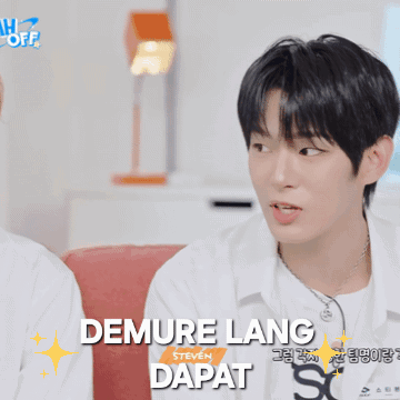 a young man with the name demure lang written on his shirt