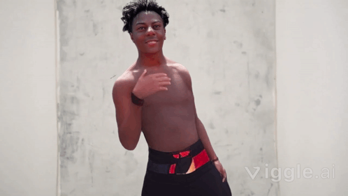A Young Man Without A Shirt Is Standing In Front Of A Wall With The Words Vigle.ai Visible In The Corner GIF
