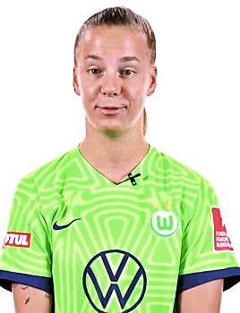 A Young Woman Wearing A Green Soccer Jersey With A Vw Logo On It . GIF