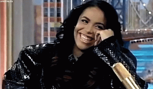 Aaliyah Giggling At Rosie O' Donnell Interview GIF
