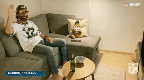 Aaron Rodgers Waving Hand GIF