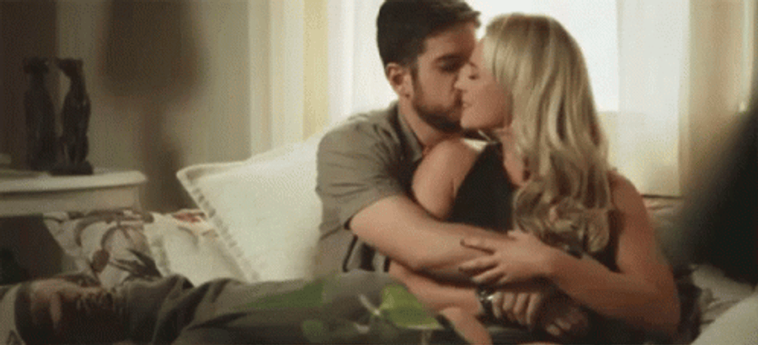Abrazo Couple On A Couch  GIF
