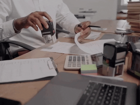 Accountant Stamping Papers GIF