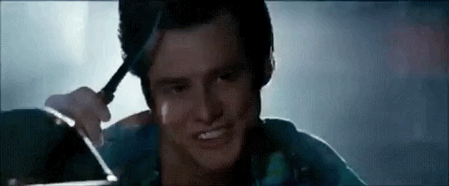 Ace Ventura Funny Torture GIF