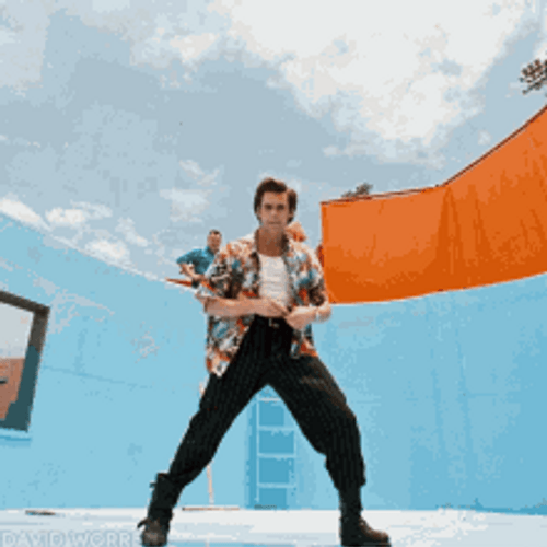 Ace Ventura Pet Detective Searching On Camera GIF