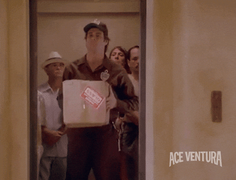 Ace Venture Holding Box Inside Elevator GIF