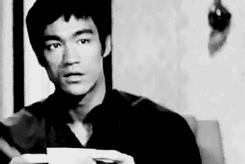 Actor Bruce Lee Head Shake GIF