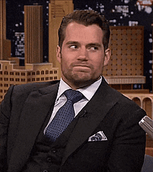 Actor Henry Cavill Shaking Head Reaction GIF