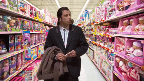 Actor John Travolta Confused At The Grocery Store GIF