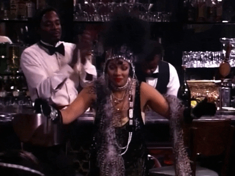 Actress Kim Fields Bow And Looking Around GIF