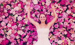 Actress Natalie Portman Lie On Flowers GIF