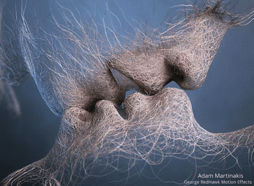 Adam Martinakis George Redhawk Motion Effects Shows A Kissing Couple GIF
