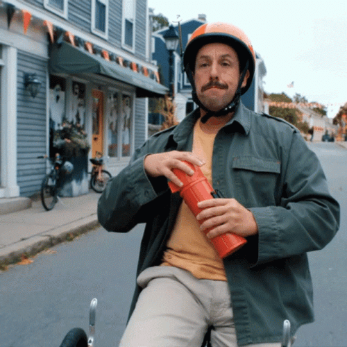 Adam Sandler Puking While Riding Bike GIF