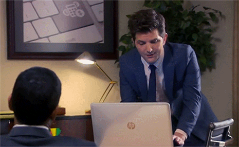 Adam Scott Closing His Laptop GIF