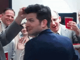 Adam Scott Winky Face GIF