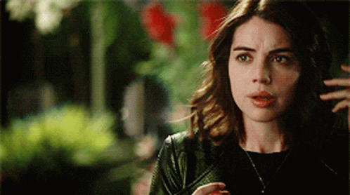 Disoriented Adelaide Kane Stroking Her Hair GIF