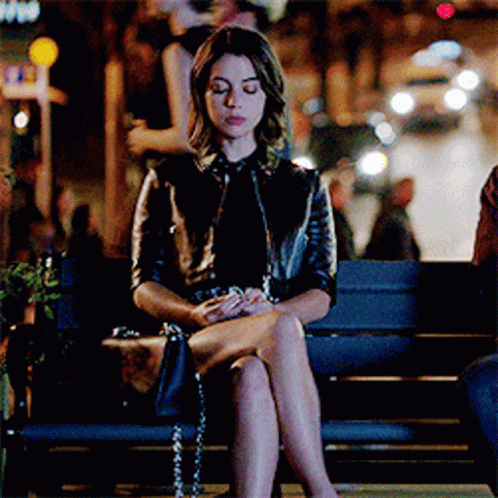 Adelaide Kane Sitting At The Park Bench GIF