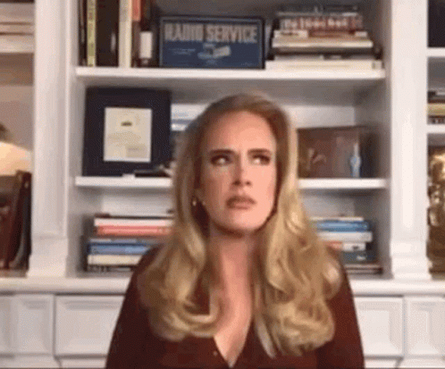 Adele Squints Her Eyes Then Nods GIF