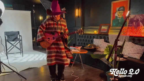 Adele Hello Boy Playing Guitar Wearing Hat GIF