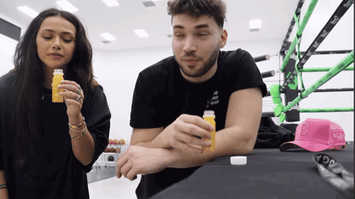 Adin Ross Drink Juice With Girl GIF