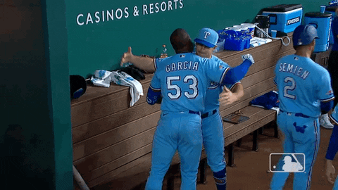 Adolis Garcia Hugging A Teammate GIF