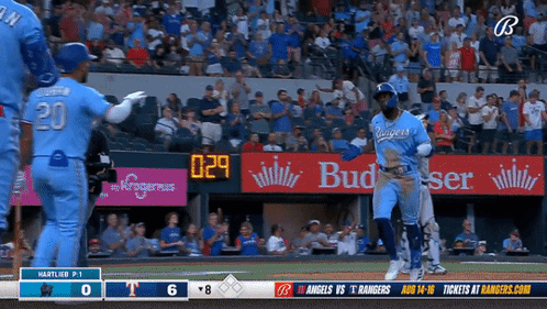 Adolis Garcia Making Contact With His Teammates GIF