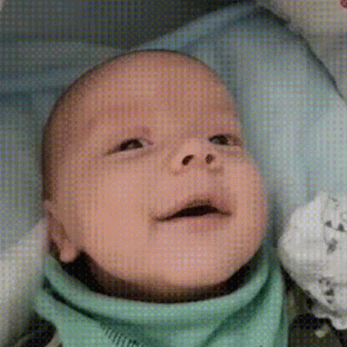 Adorable Baby Smiling Winking GIF