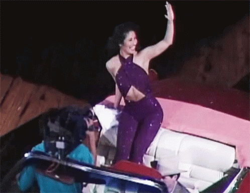 Adorable Selena Quintanilla Waving GIF