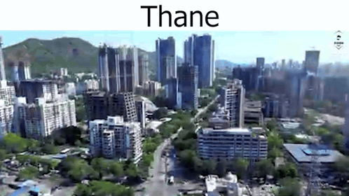 Aerial City View With Buildings And Trees GIF