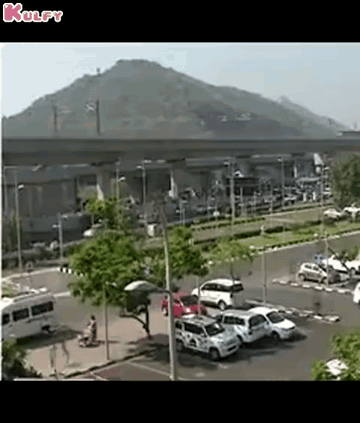Aerial Parking Lot With Cars and Mountain