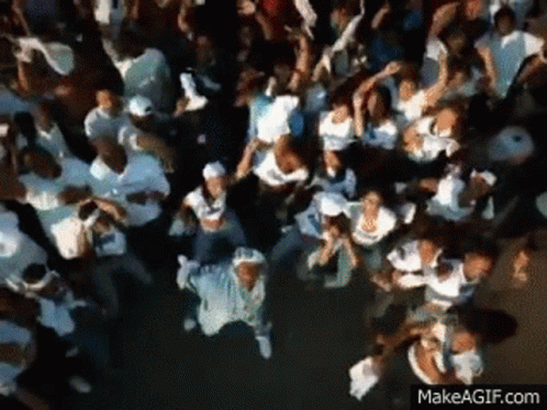 Aerial View Large Crowd Dancing at Concert