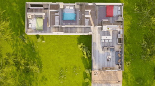 Aerial View of House With Three Bedrooms and Deck