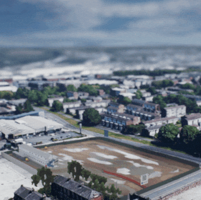 Aerial View of Residential Area With Fence and Buildings