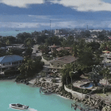 Aerial View of Tropical Island With Boat