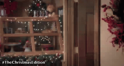 African American Christmas Couple Kissing GIF