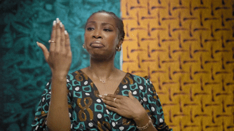 African American Christmas From Woman Looking On Hand GIF