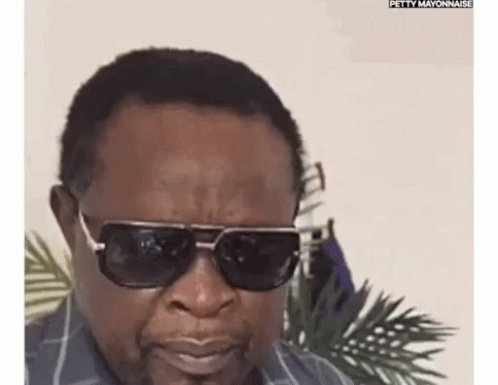 African Man Putting Glasses GIF