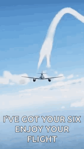 Airplane Flying Through Blue Sky