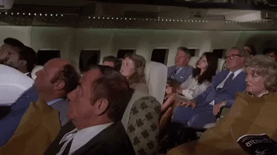 Airplane Movie Dragging A Body GIF