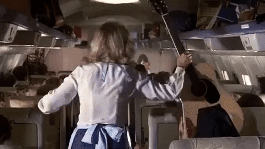 Airplane Movie Guitar Fail GIF