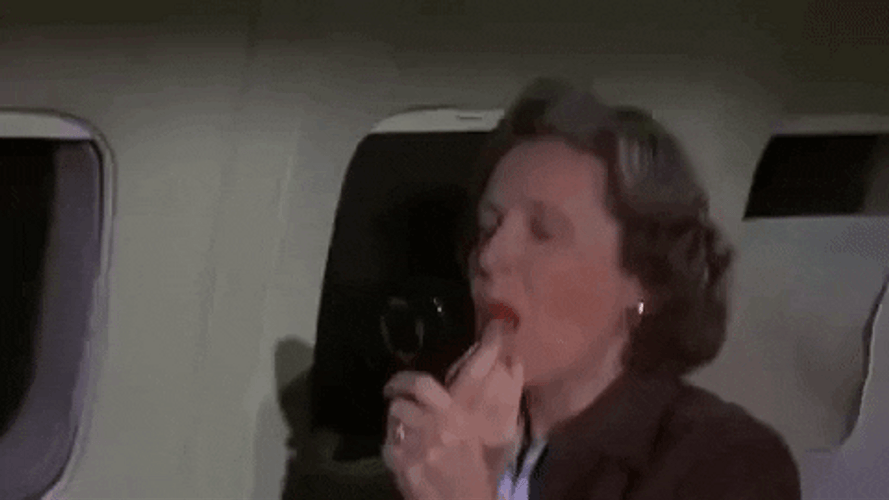Airplane Movie Lady Putting Lipstick GIF