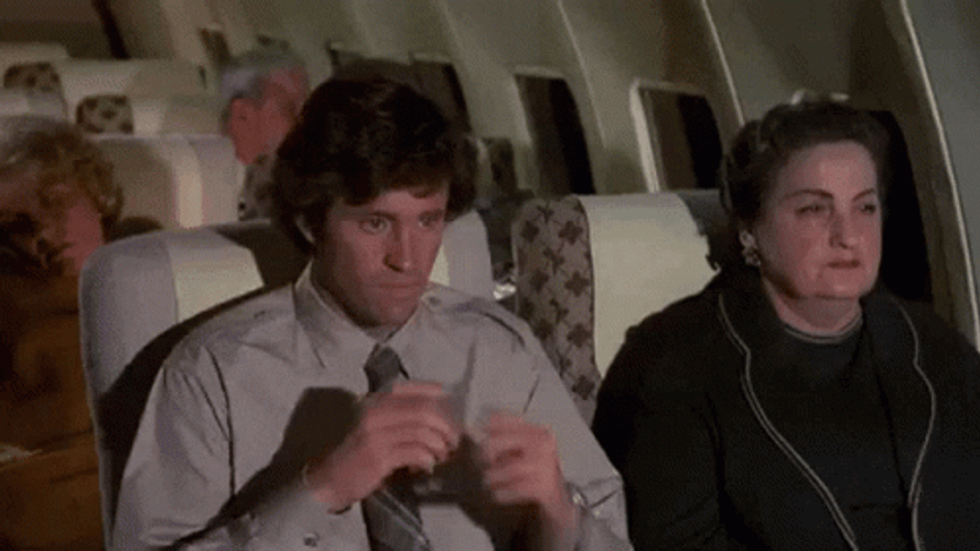 Airplane Movie Ted Striker Pouring Himself GIF