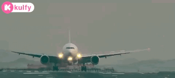 Airplane Taking Off on Airport Runway with Kolfy Logo
