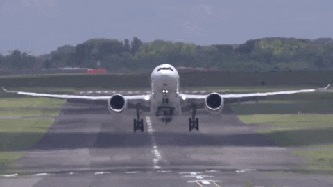 Airplane Taking Off with Red Tail Light