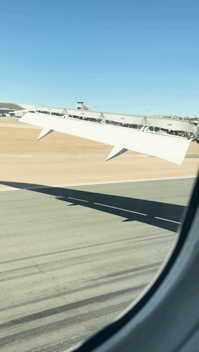 Airplane Wing Visible Through Window
