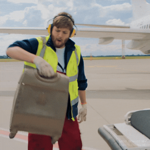 Airport Luggage Handler Pretend Luggage As Guitar GIF