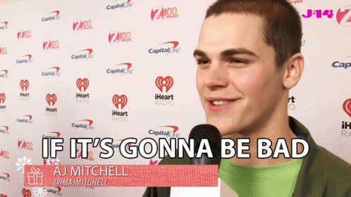 Aj Mitchell Says If It 'S Gonna Be Bad In Front Of A Wall Of Iheart Radio Logos GIF