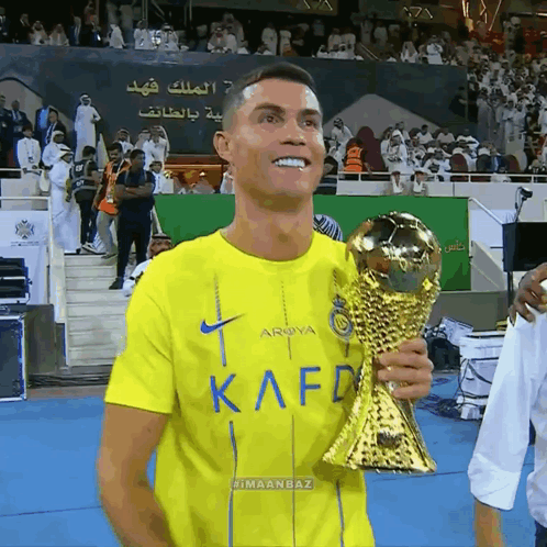 Al Nassr Cristiano Ronaldo Kissing World Cup Trophy GIF